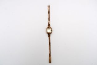 An Omega cocktail watch. Stamped 9ct. Weight 19.94 grams. Condition: good to fair in keeping with