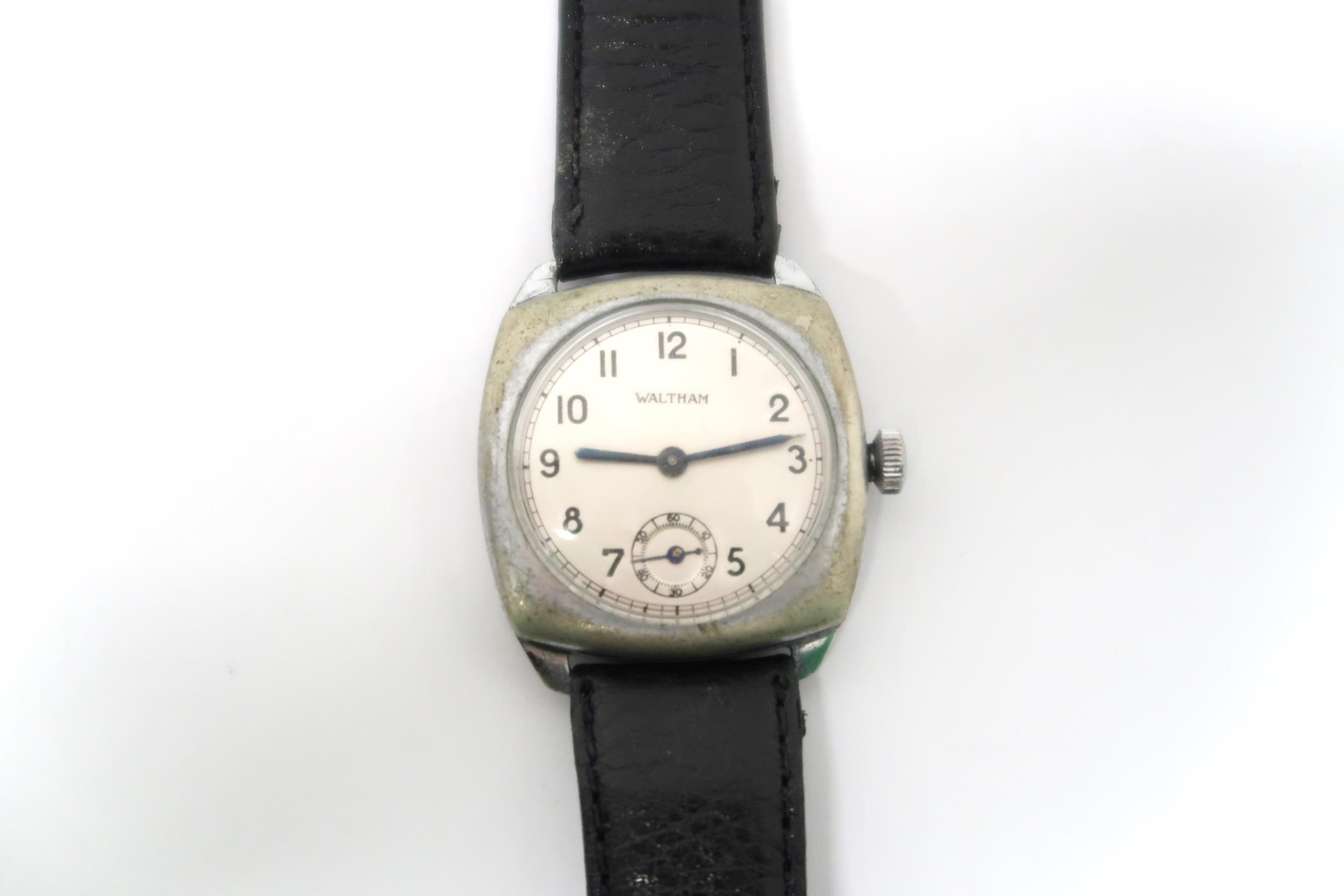 A Gents Waltham wristwatch with silvered dial, Arabic numerals to chapter ring with a subsidiary