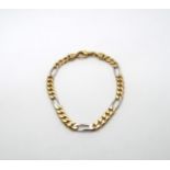 A yellow and white gold marked .750 bracelet, approx 15.9 grams