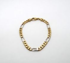 A yellow and white gold marked .750 bracelet, approx 15.9 grams