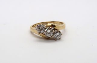 An 18ct yellow gold 3 stone diamond ring, total diamond weight 1ct, diamond weight is marked on