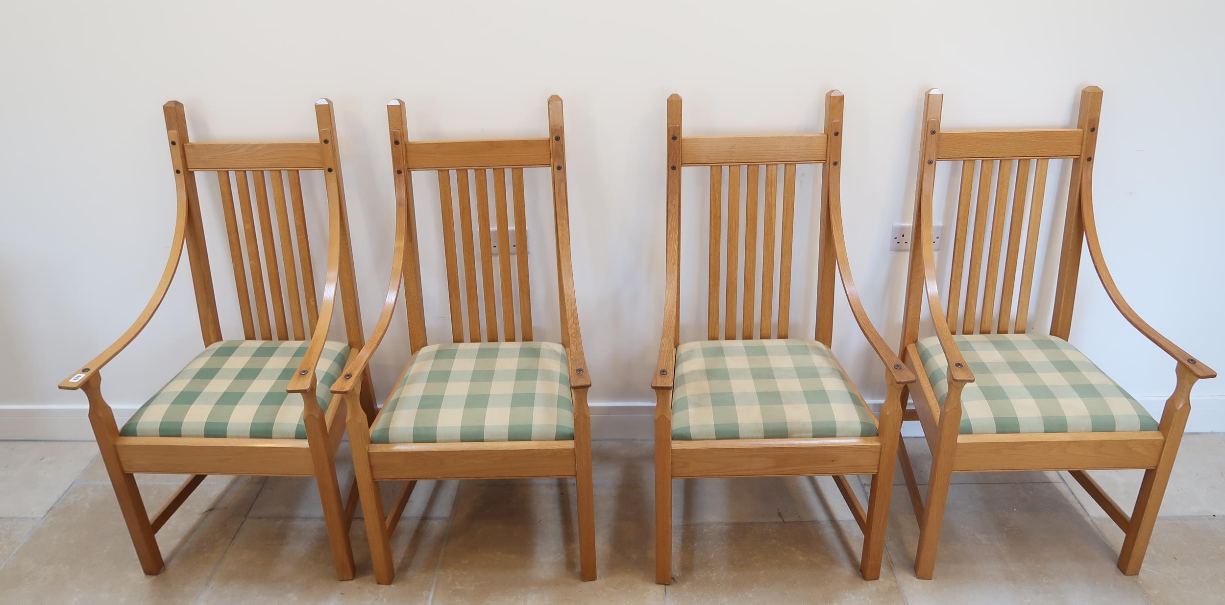 A set of four oak chairs by Luke Hughes