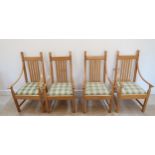 A set of four oak chairs by Luke Hughes