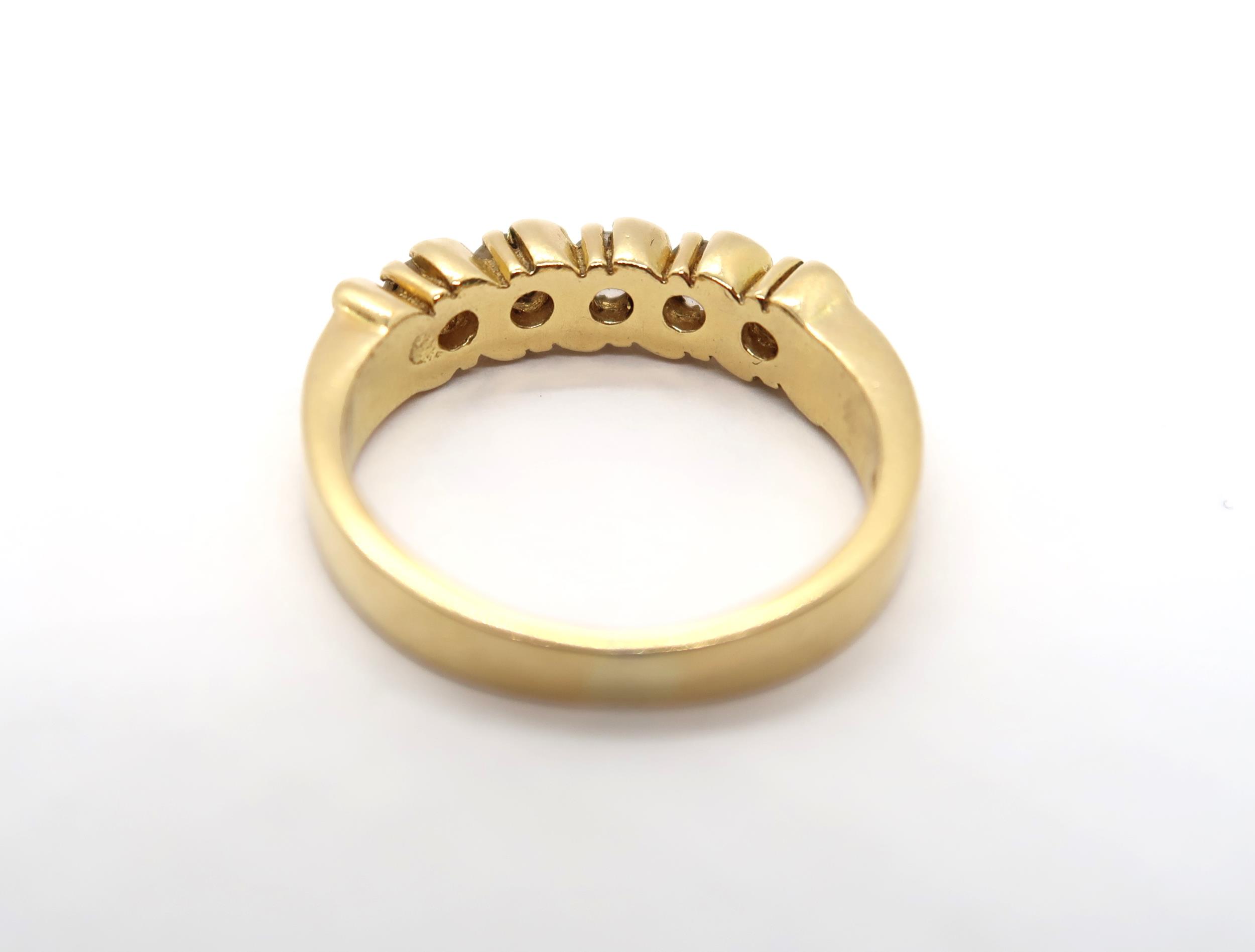 A diamond eternity ring in yellow colour metal, part hoop, comprising of five round brilliant cut - Image 3 of 3