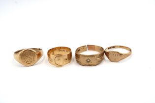 Four 9ct gold dress rings. Total weight 10.5 grams