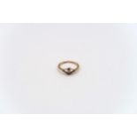 An old cut diamond dress ring estimated 0.06ct. Stamped 18ct, weight 1.69 grams, size L 1/2; a white