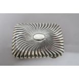 A silver cigarette case with ribbed decoration, approx 2.6 troy oz