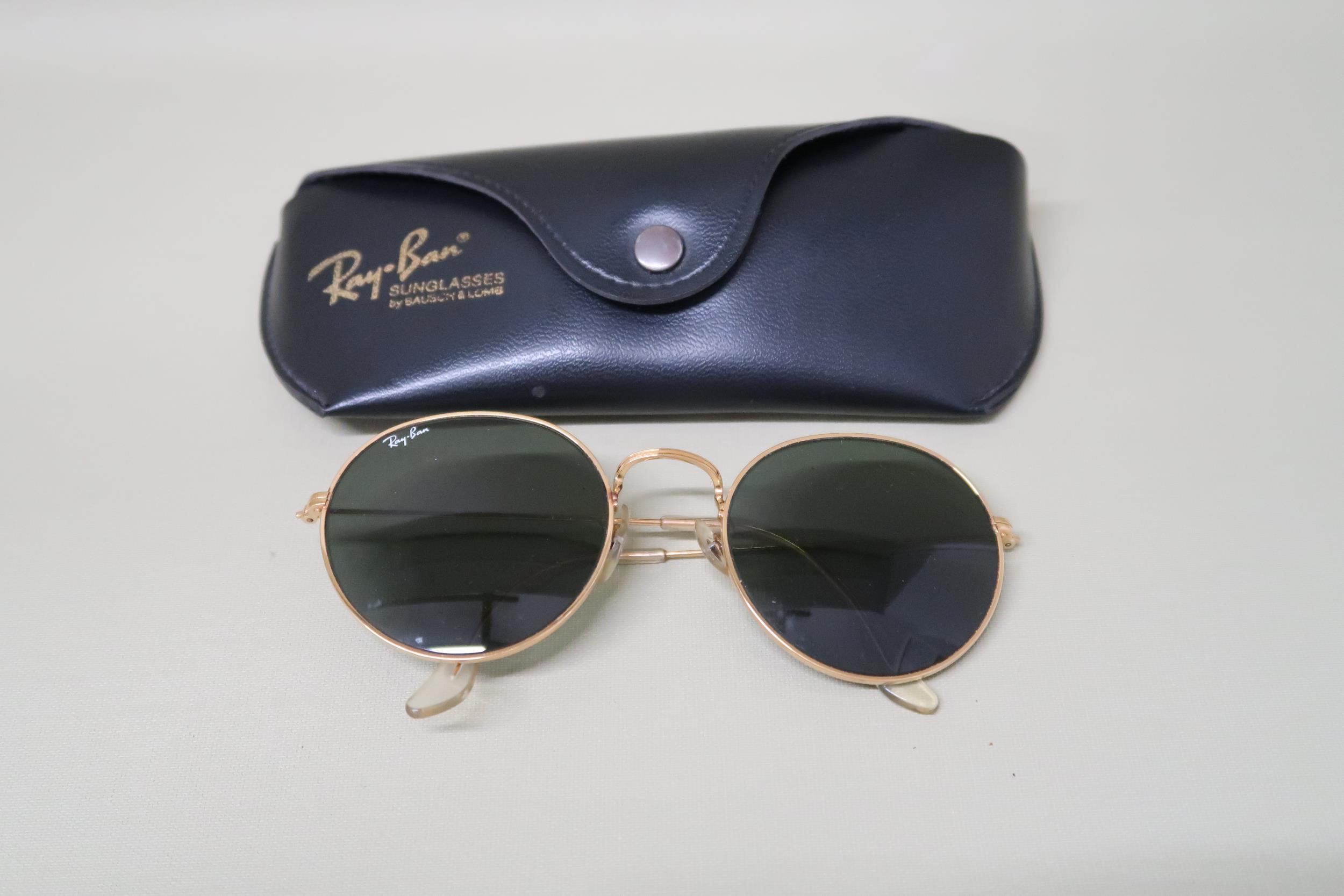 A pair of Ray-ban sunglasses