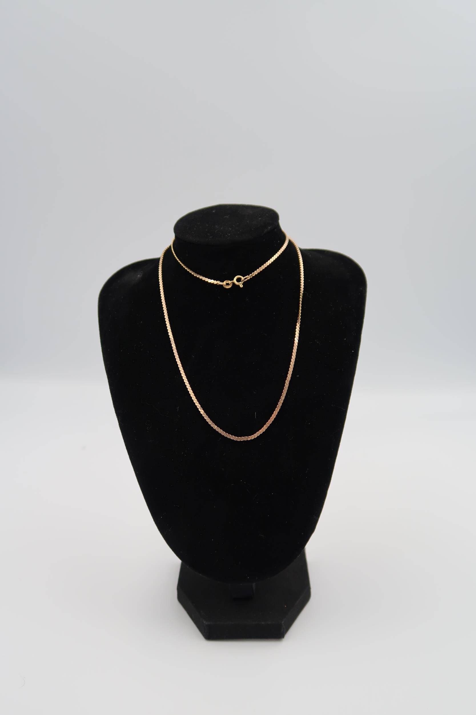 Four 9ct gold necklaces and a bracelet, total weight 15 grams - Image 4 of 5