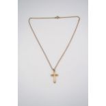 A 9ct gold cross pendant suspended from 430mm belcher link chain stamped 9ct. Weight 4.80 grams.