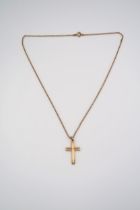 A 9ct gold cross pendant suspended from 430mm belcher link chain stamped 9ct. Weight 4.80 grams.