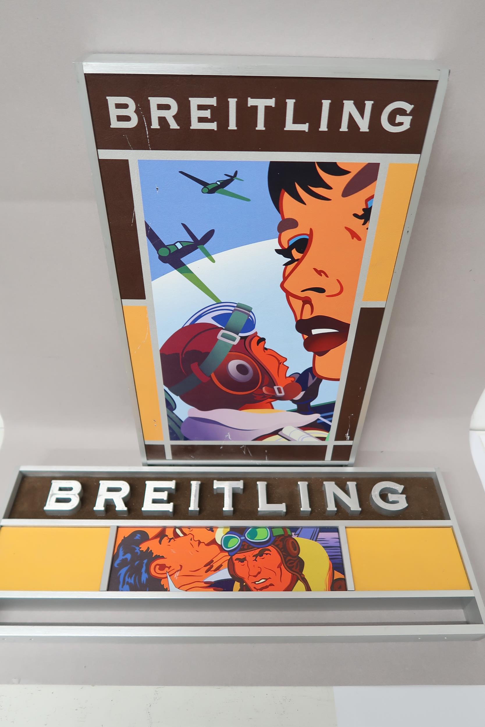 Two Breitling advertising plaques - 45cm x 16.4cm and 40cm x 22.5cm