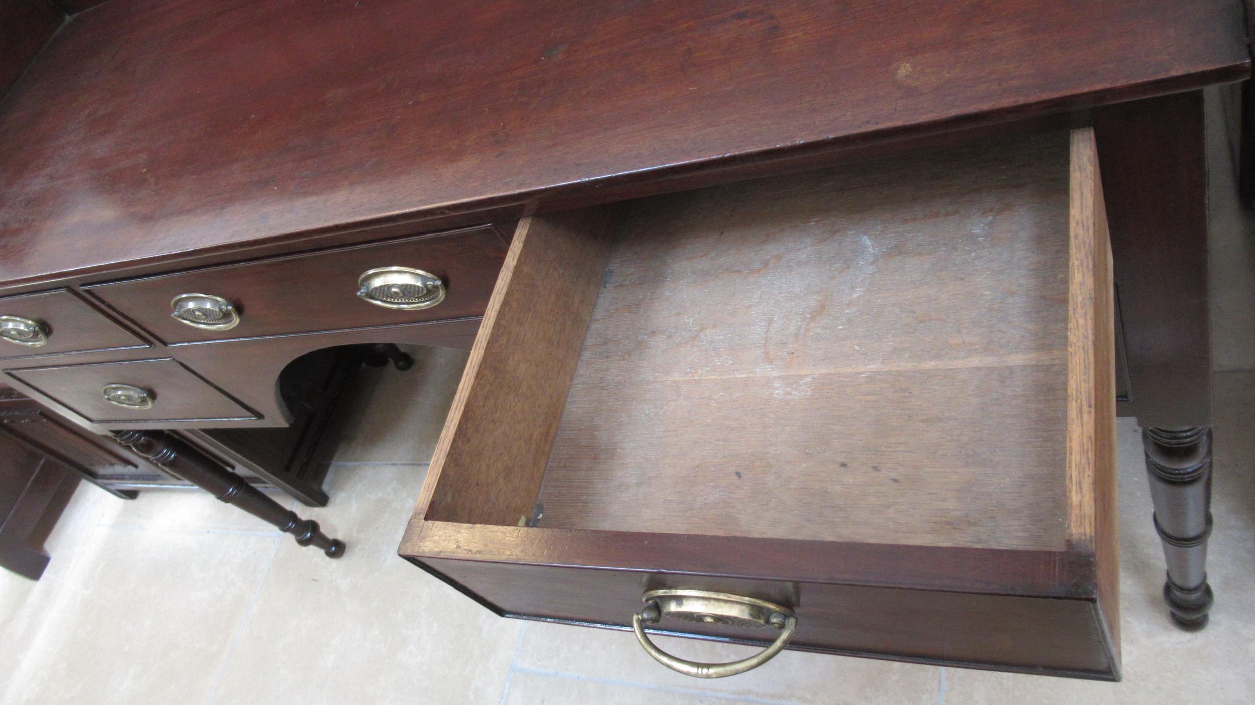 A Victorian mahogany five drawer double washstand/desk on turned legs with upper gallery - Width - Image 2 of 2