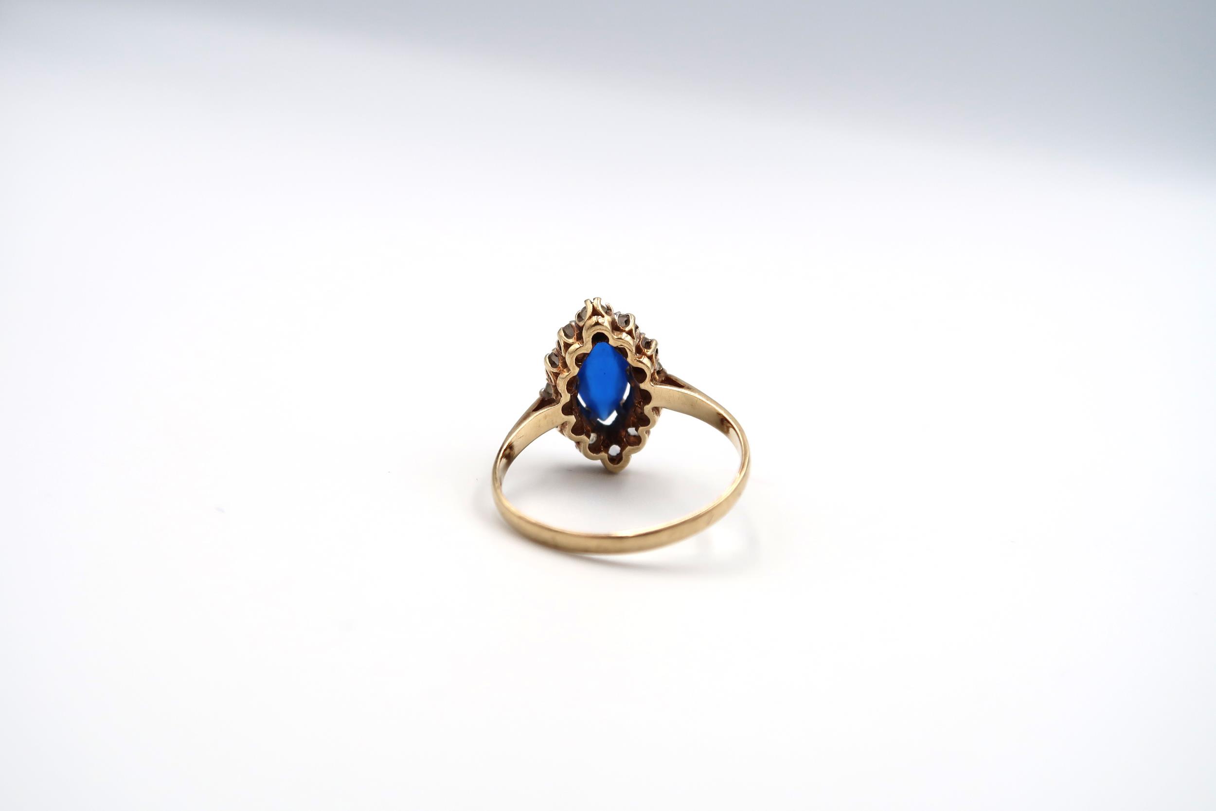 Two 9ct gold rings. To include a sapphire and diamond cluster ring and a paste set marquise shape - Image 3 of 6