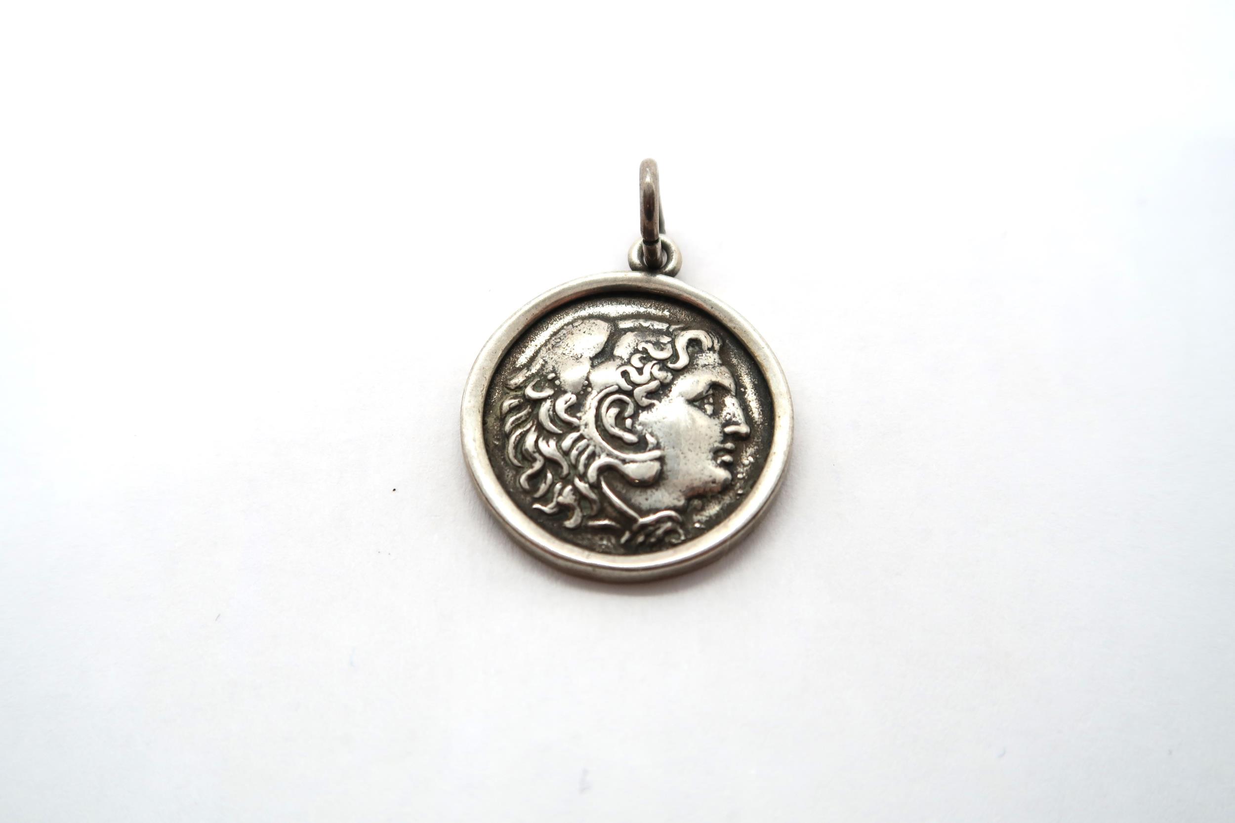A Makedonian silver tetradrache 4.5h.v.chr, Alexander head within pendant