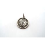 A Makedonian silver tetradrache 4.5h.v.chr, Alexander head within pendant