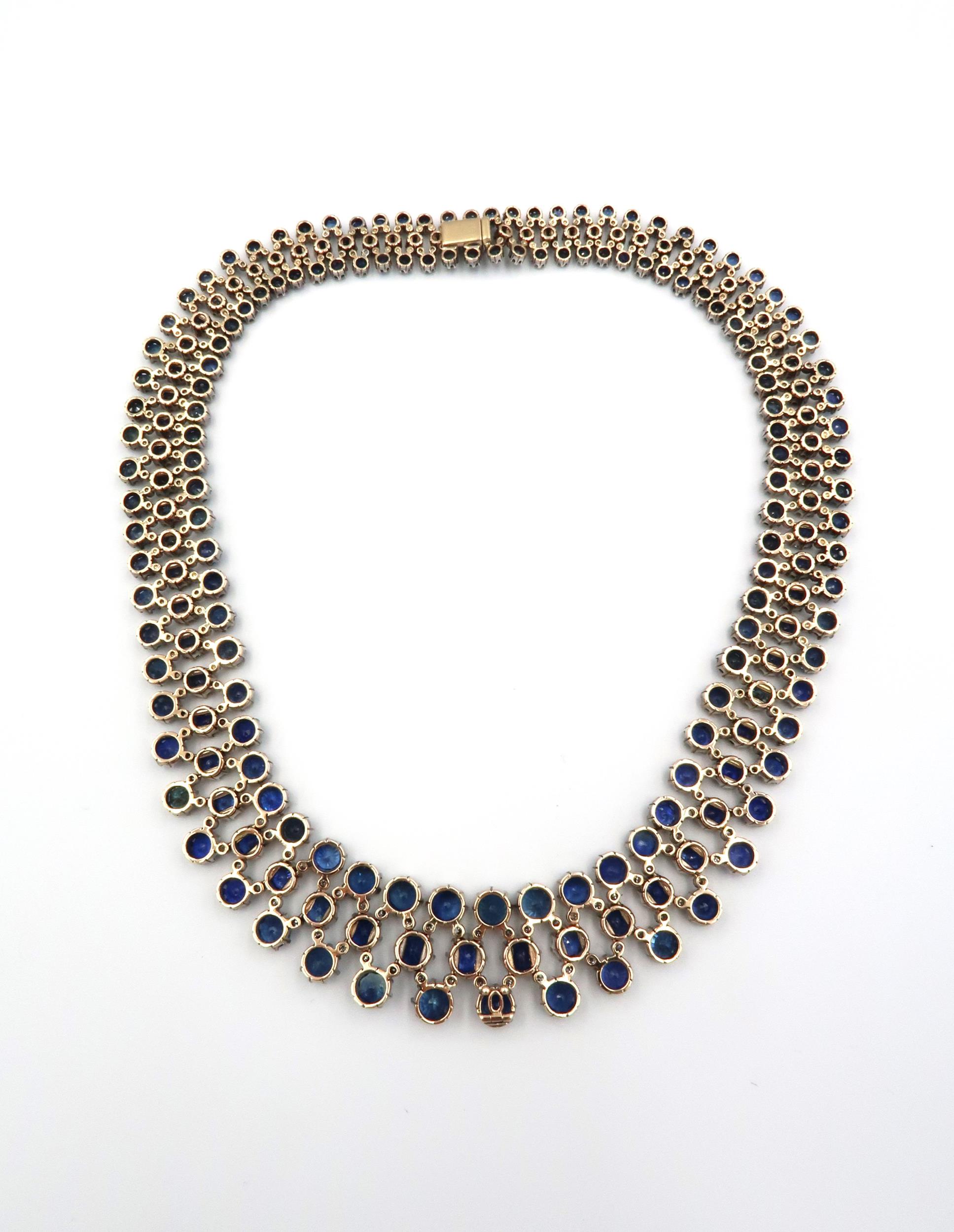 A stunning three row articulated sapphire and diamond necklace. The graduating circular claw set - Image 3 of 11