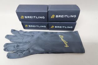 Four pairs of boxed Breitling gloves