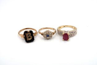 Three rings to include: a 9ct gold sapphire and white stone cluster ring weight 1.78 grams, size