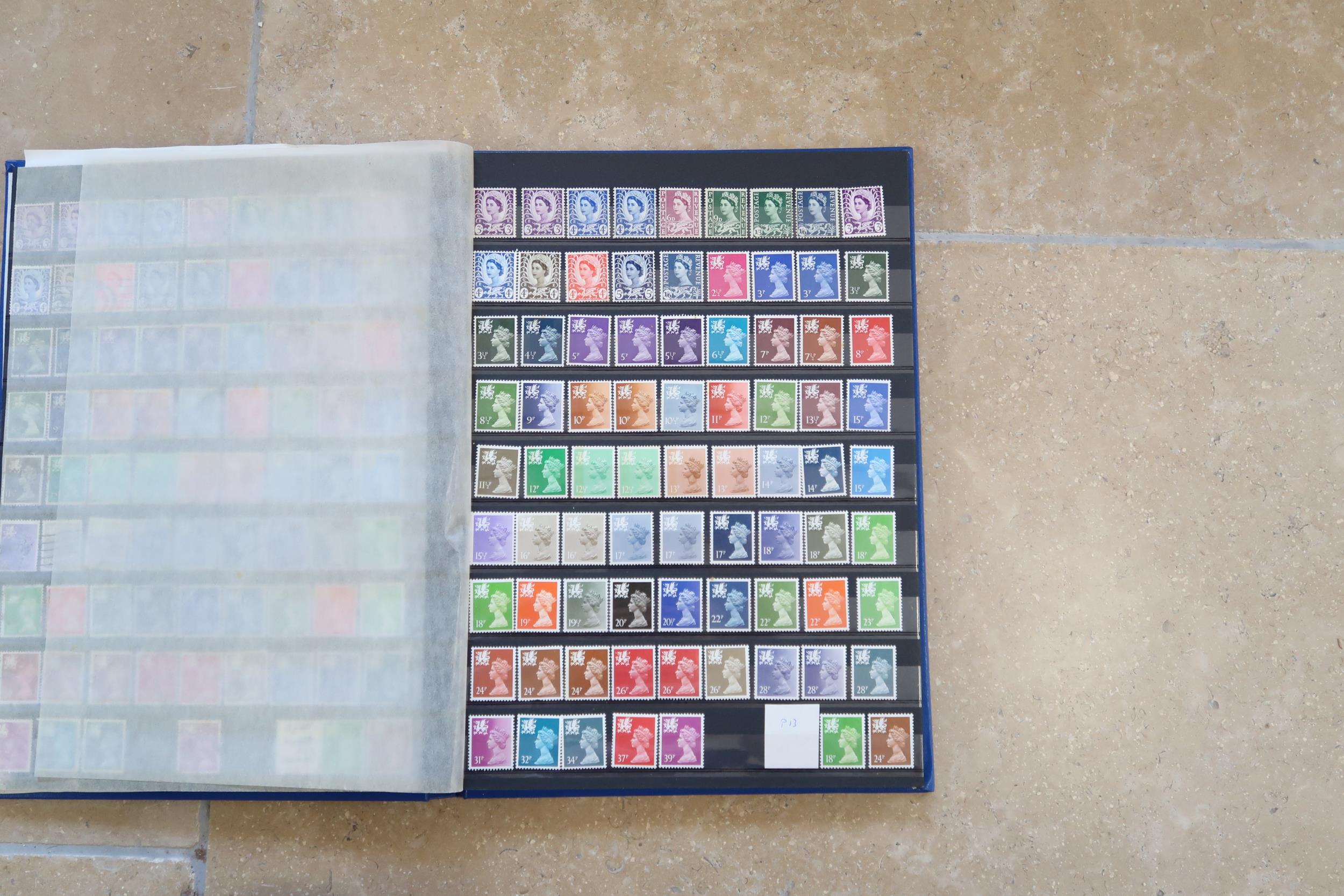 Five stamp albums including Jersey circa 1990's, Guernsey and Alderney, Great Britain circa 1990s,