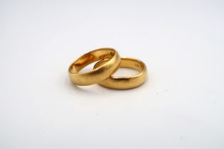 Two 22ct gold wedding bands, total weight 6.9 grams