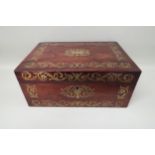 A brass inlaid sewing box, foliate design with a central cartouche and fitted interior