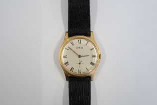 A Gents Oris manual watch on a brown leather strap, running in saleroom