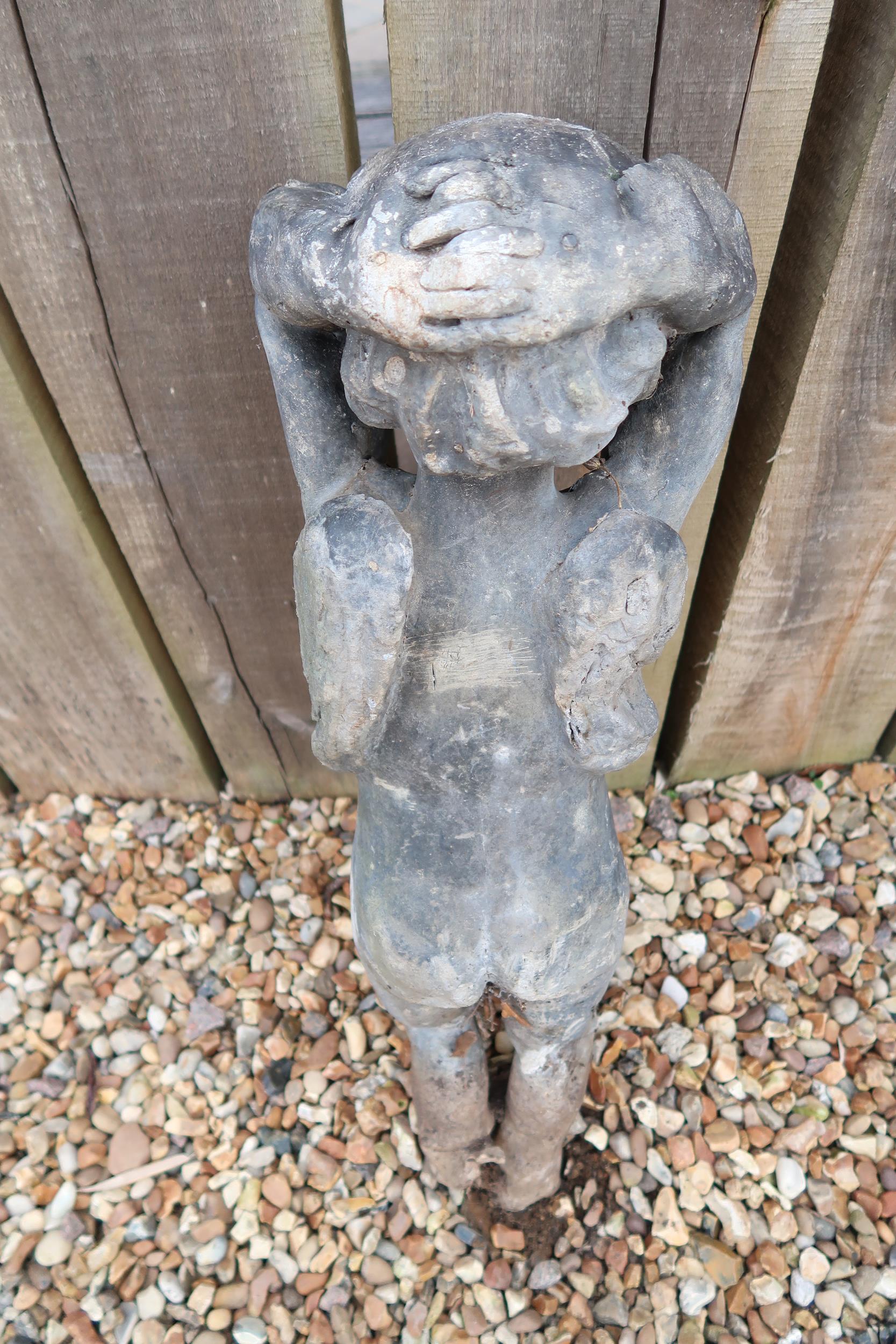 A lead garden figure of a cherub, 70cm high - Image 4 of 4