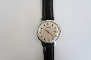 A Gents Oris watch with date on a black leather strap, running in saleroom