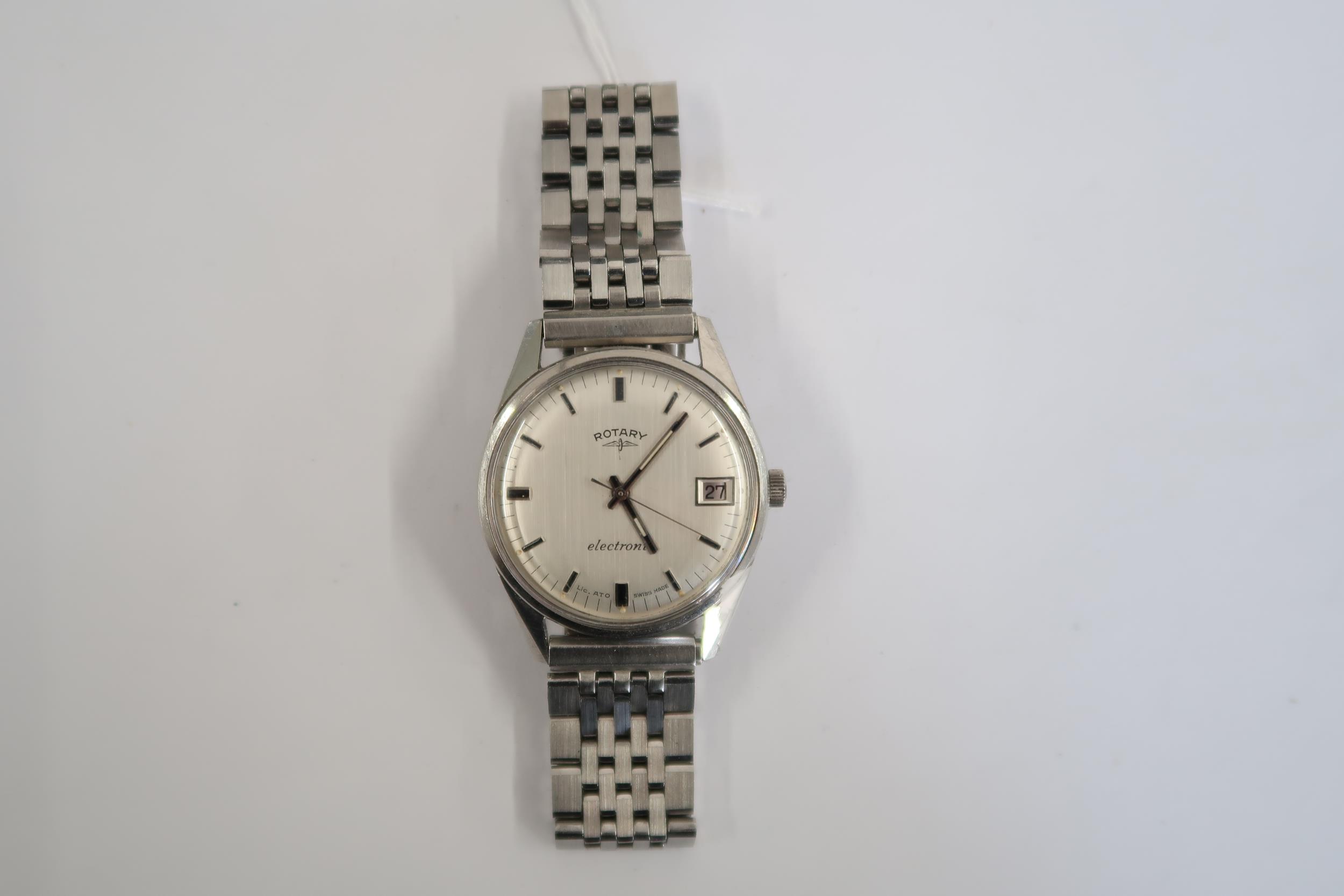 A Gents Rotary electric watch with date on a stainless steel bracelet, running in saleroom - Image 2 of 3