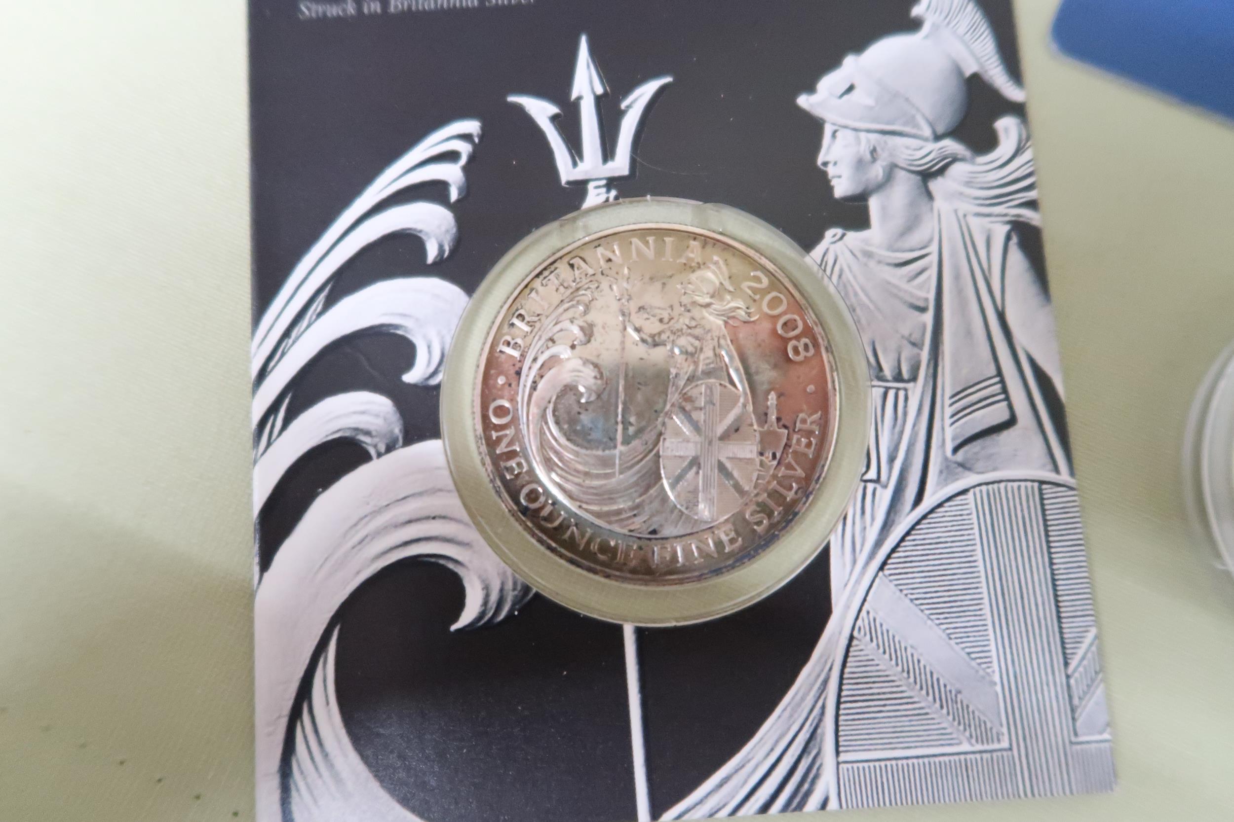 Seven pure silver proof coins and a Britannia two pound sterling silver bullion coin and a ten pound - Image 2 of 4