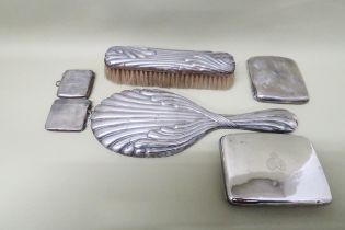 A selection of H.M. silver - approx total weight 10 troy oz - Two vestas, two cigarette cases,