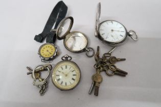A silver hallmarked full hunter pocket watch, a German silver pocket watch with Roman numerals to