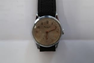 A gents Newark auto watch on black leather strap - working in the saleroom - case size 32mm