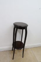 An early 20th century oak two tier jardiniere/plant stand - Height 93cm