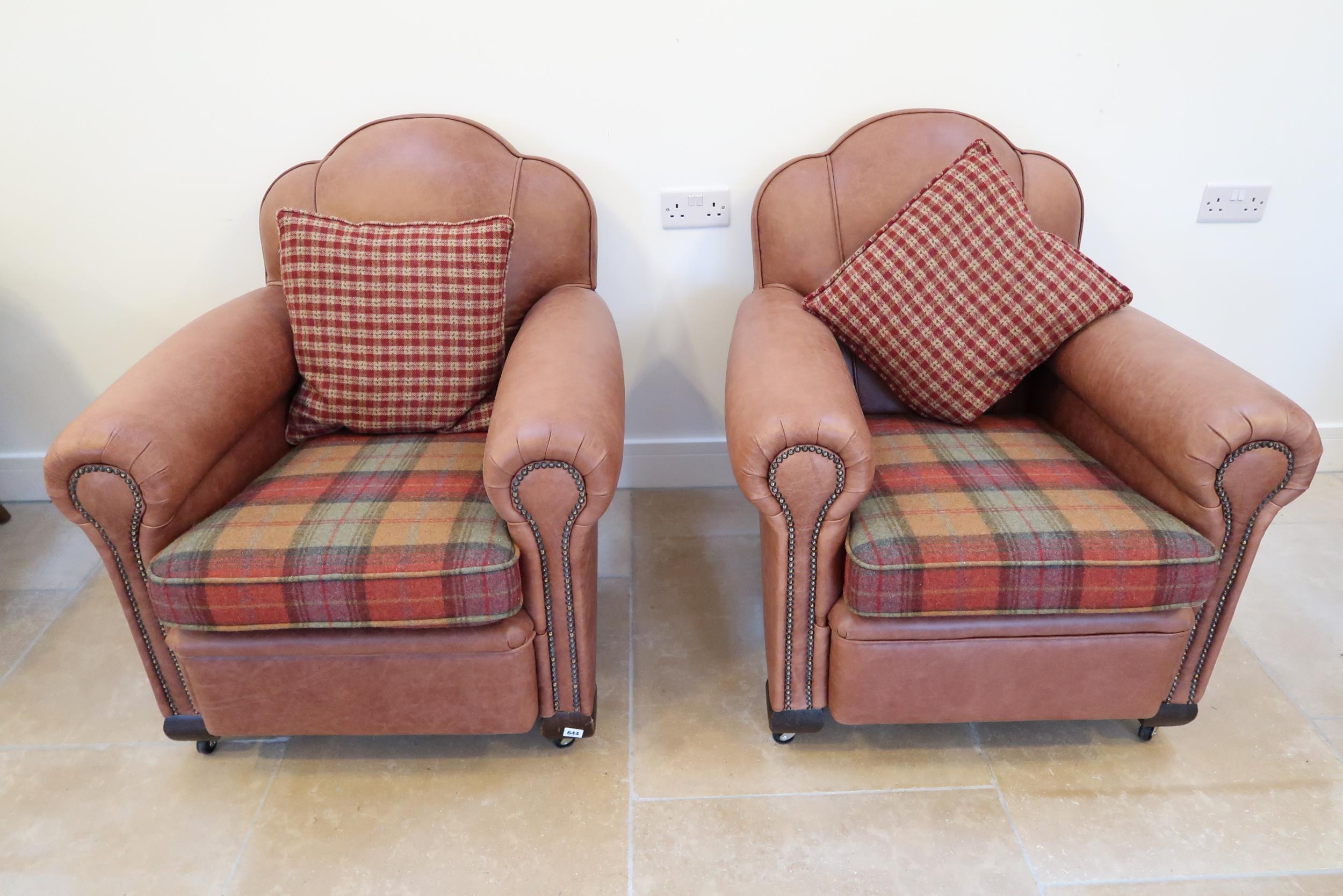 A pair of 1920s Art Deco armchairs recently recovered in leather and in nice condition