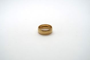 An 18ct yellow gold wedding band, size J, approx 4.1 grams