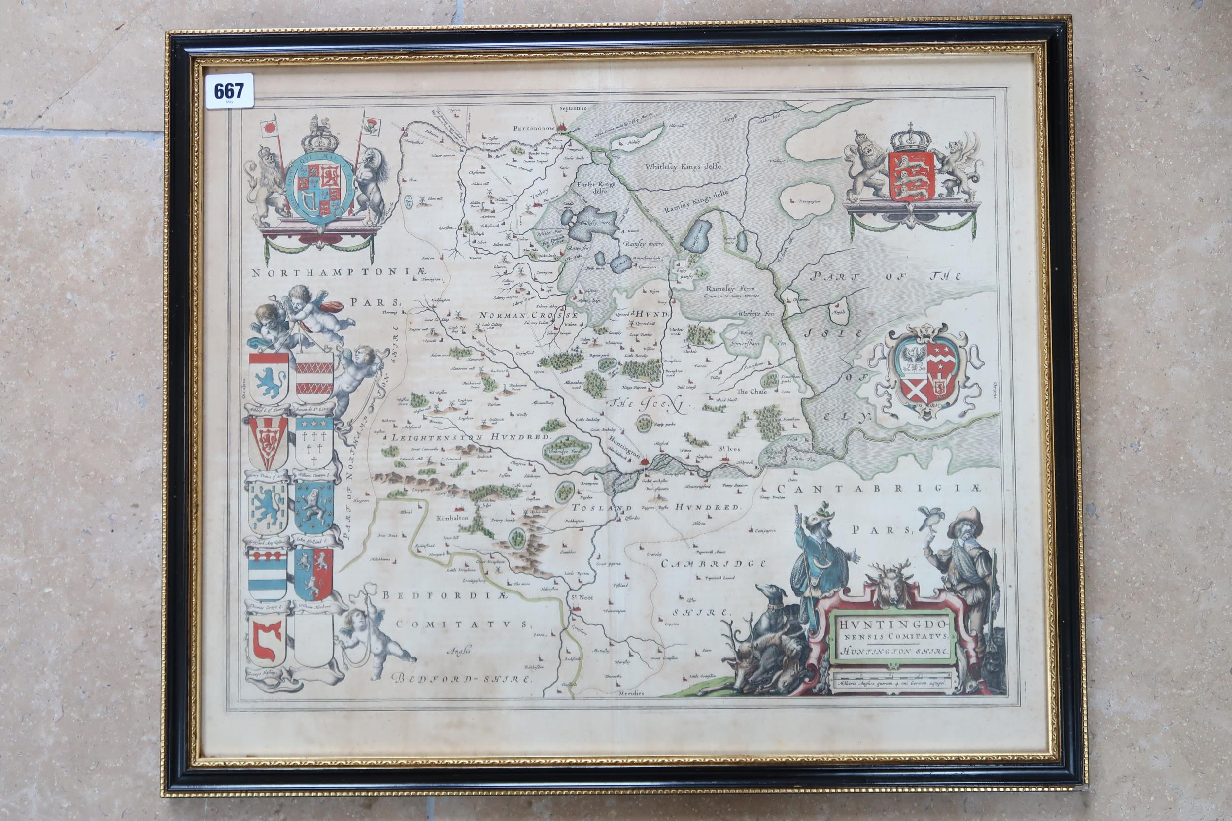 A framed map of Huntingdonshire by Blaeu - double sided - 53cm x 44cm - 1647