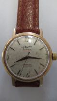 A gents Felca Prescott watch on brown leather strap - working in the saleroom - case size 30mm
