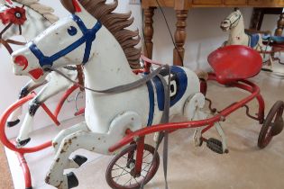 A 20th Century Metal Tramp Horse and wagon, 110 cm long x 50 cm wide x 73 cm high.