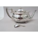 A silver tea pot and a silver caddy spoon - approx weight 22 troy oz - hallmarks rubbed