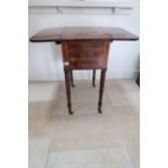 A good quality early 19th century Cuban mahogany work table, three drawers and two dummy drawers