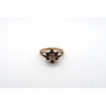 A 9ct diamond and sapphire rose gold cluster ring, size N