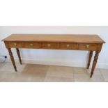 A good quality oak five drawer table on turned legs - made by a local cabinet maker - Width 180cm