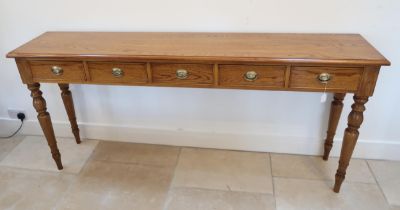 A good quality oak five drawer table on turned legs - made by a local cabinet maker - Width 180cm