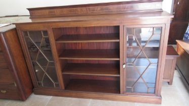 A circa 1900's mahogany and satinwood crossbanded inlaid open astragal glazed bookcase with