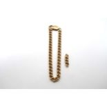 A 9ct yellow gold link bracelet with lobster claw clasp, approx 12.1 grams