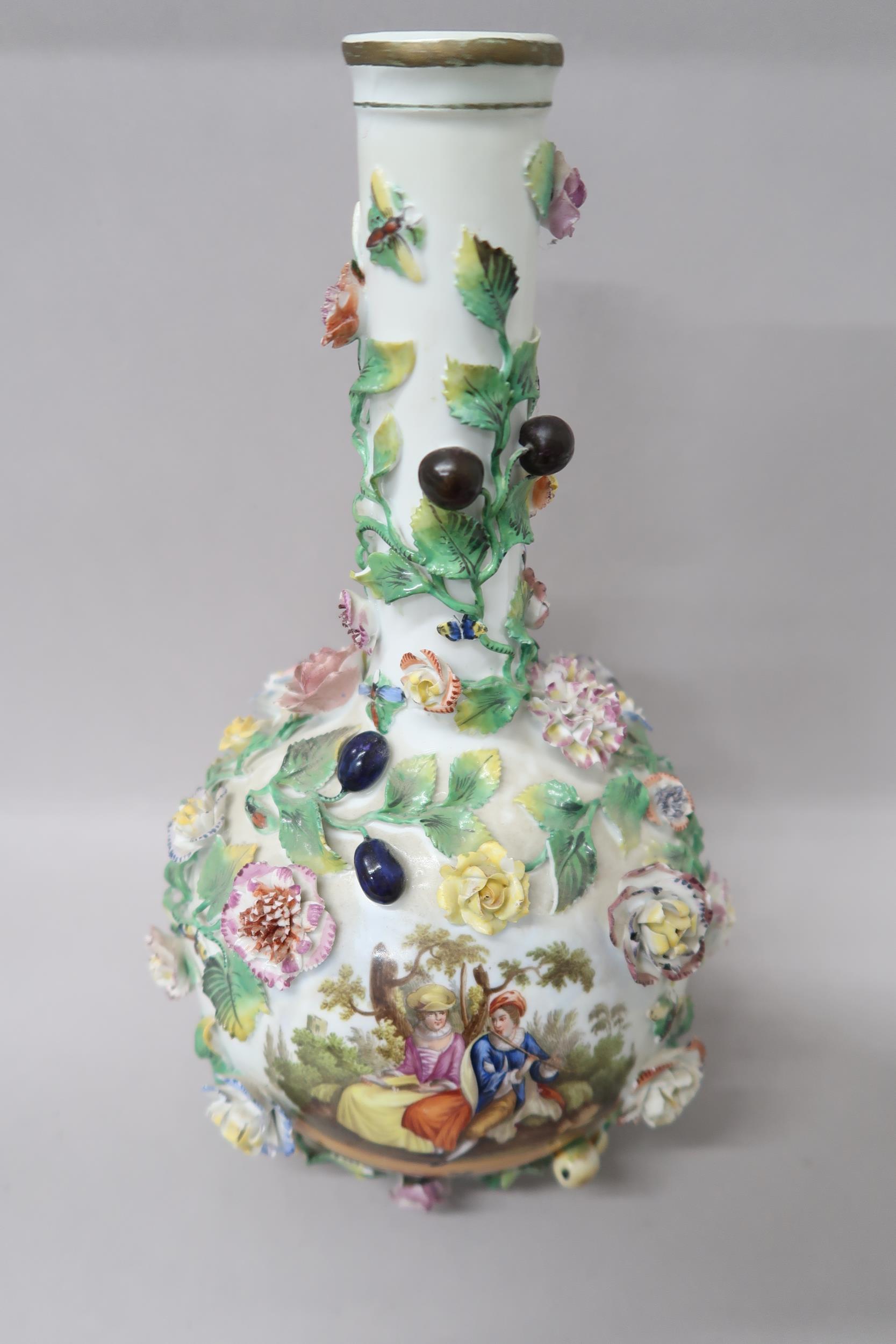 A Meissen style vase in the manner of Carl Thieme decorated with flowers and fruit, 30cm high x 17cm