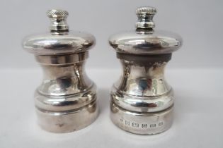 Two silver hallmarked peppers - Birmingham