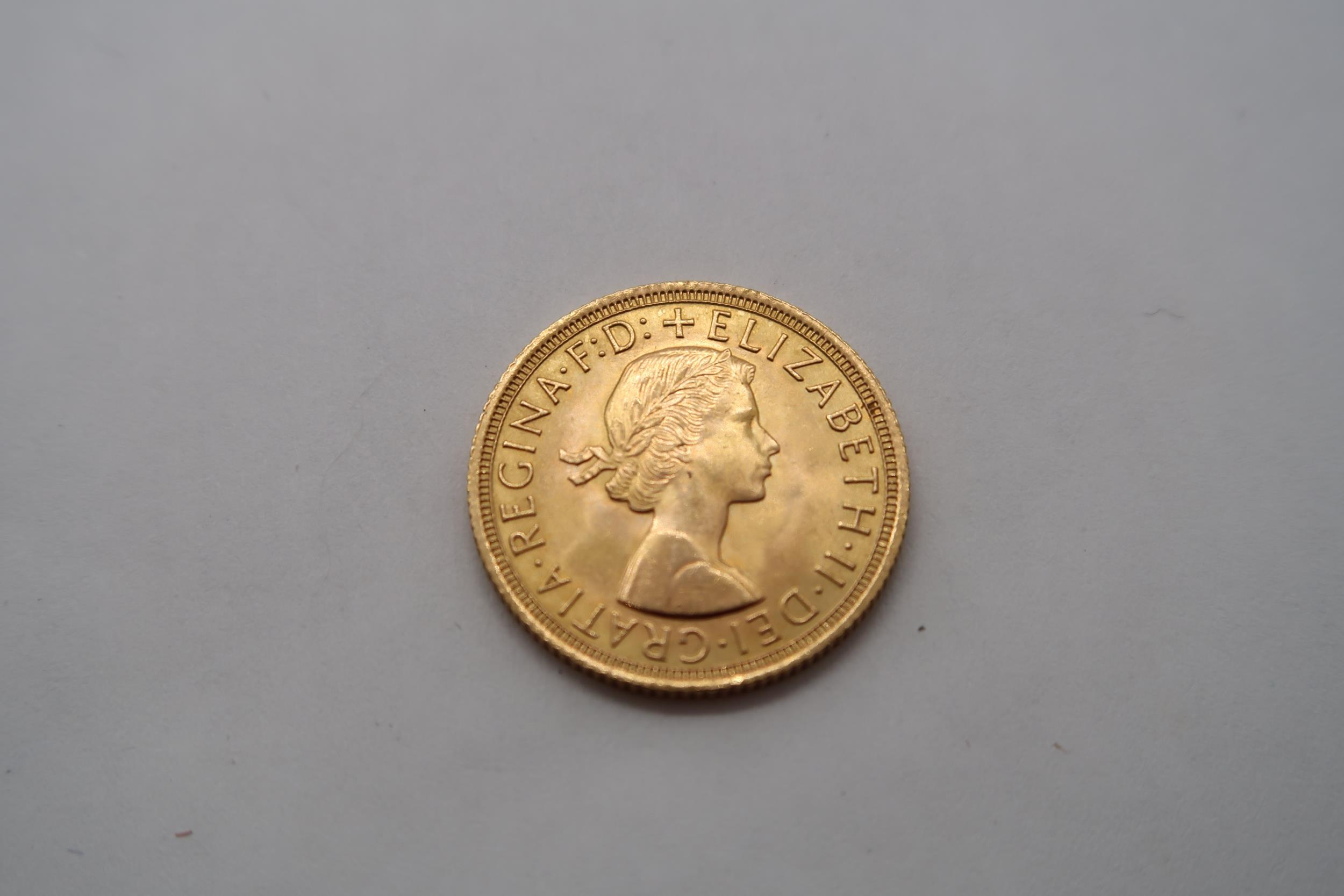 A 1963 full gold sovereign, approx 7.98 grams - Image 2 of 2
